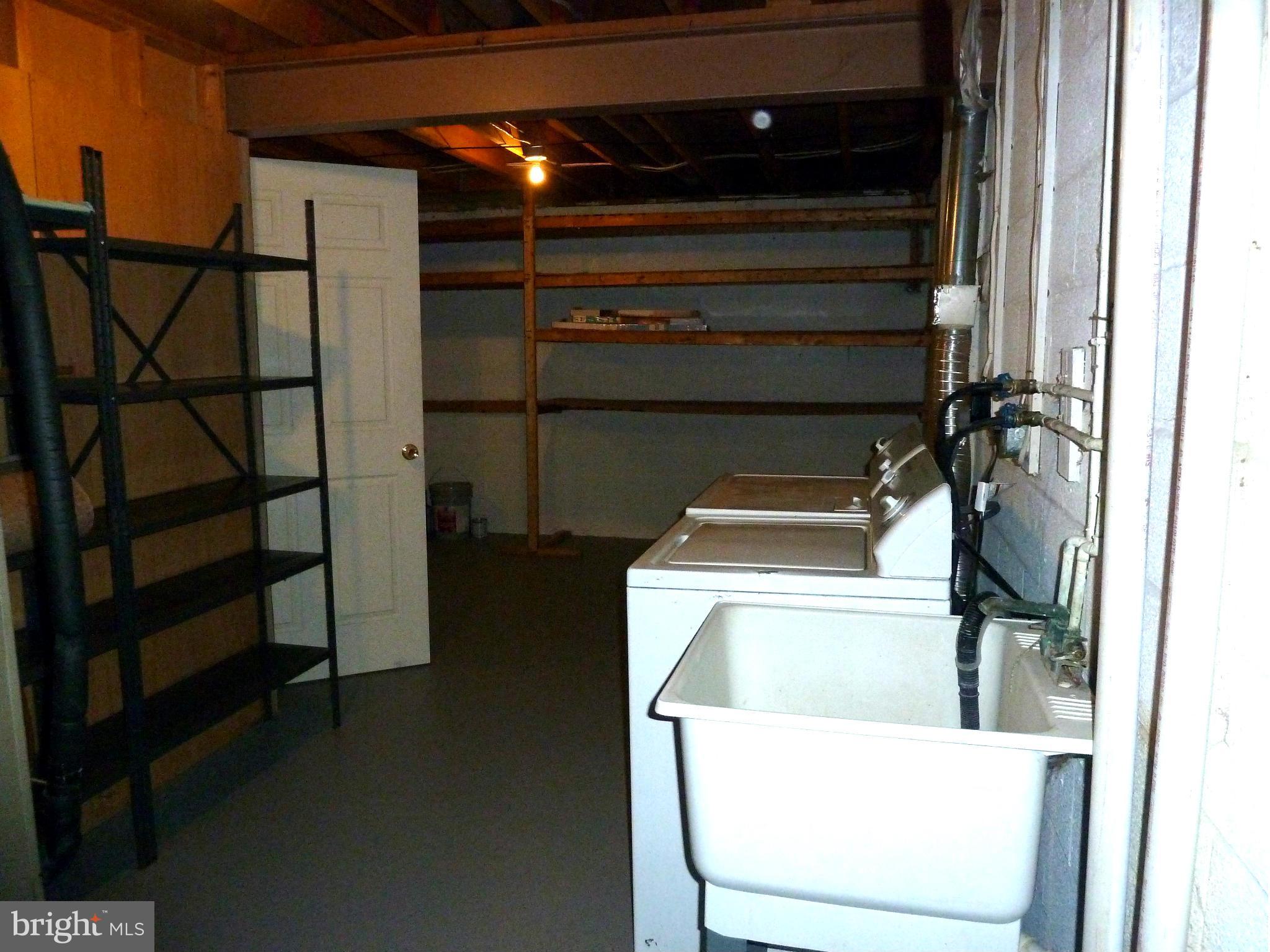 1016 Windrush Lane, Unit 25 Sandy Spring, MD 20860 - Photo 28 of 30 Unfinished Storage & Utility Room
