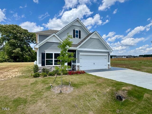 140 Continental Lane Smithfield, NC 27577 - Photo 1 of 28 a front view of house with yard and green space