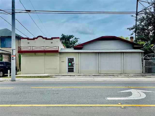 a view of a street with a building