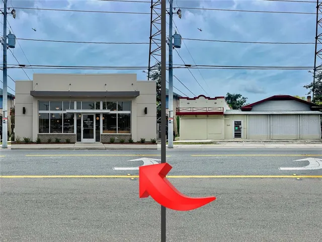 a view of a house with a swimming pool