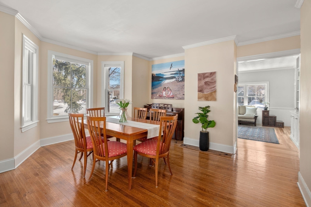 103 Oak Street Reading, MA 01867 - Photo 12 of 35 a view of a dining room with furniture window and wooden floor