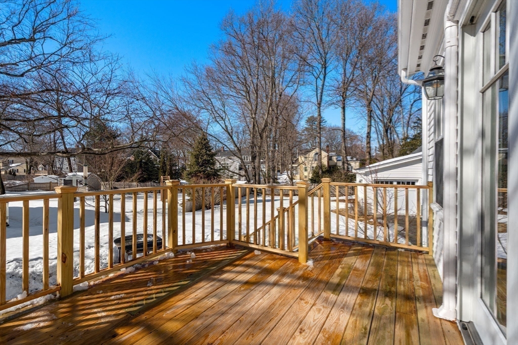 103 Oak Street Reading, MA 01867 - Photo 28 of 35 a view of a balcony with wooden fence