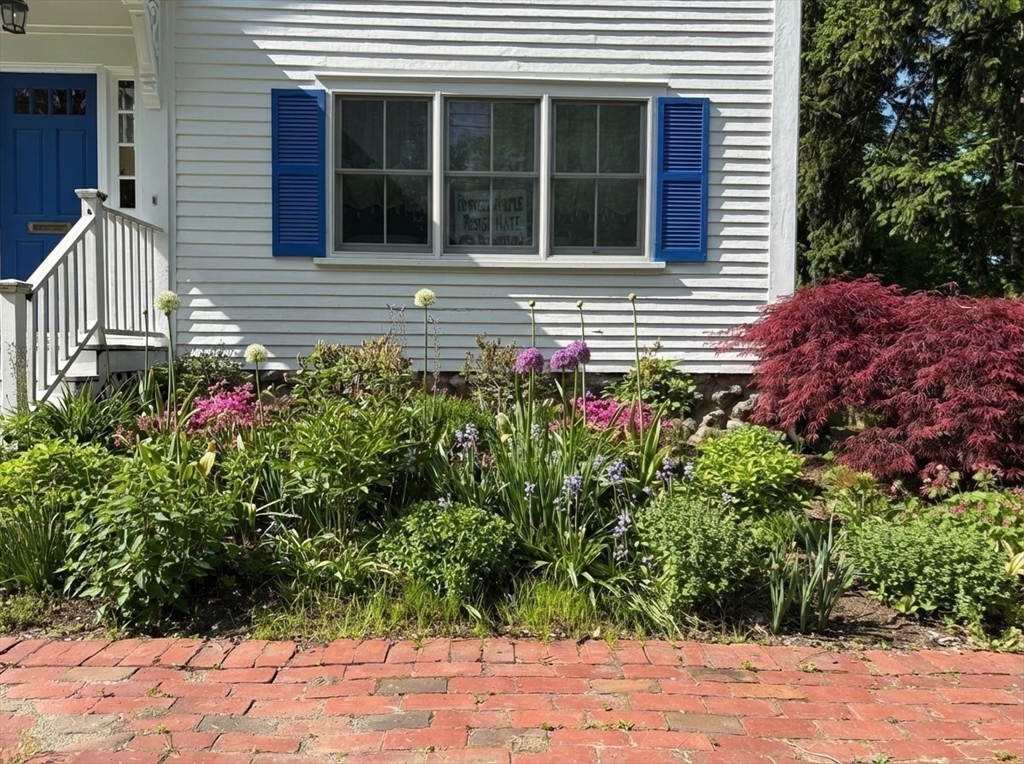 103 Oak Street Reading, MA 01867 - Photo 31 of 35 a view of a house with potted plants