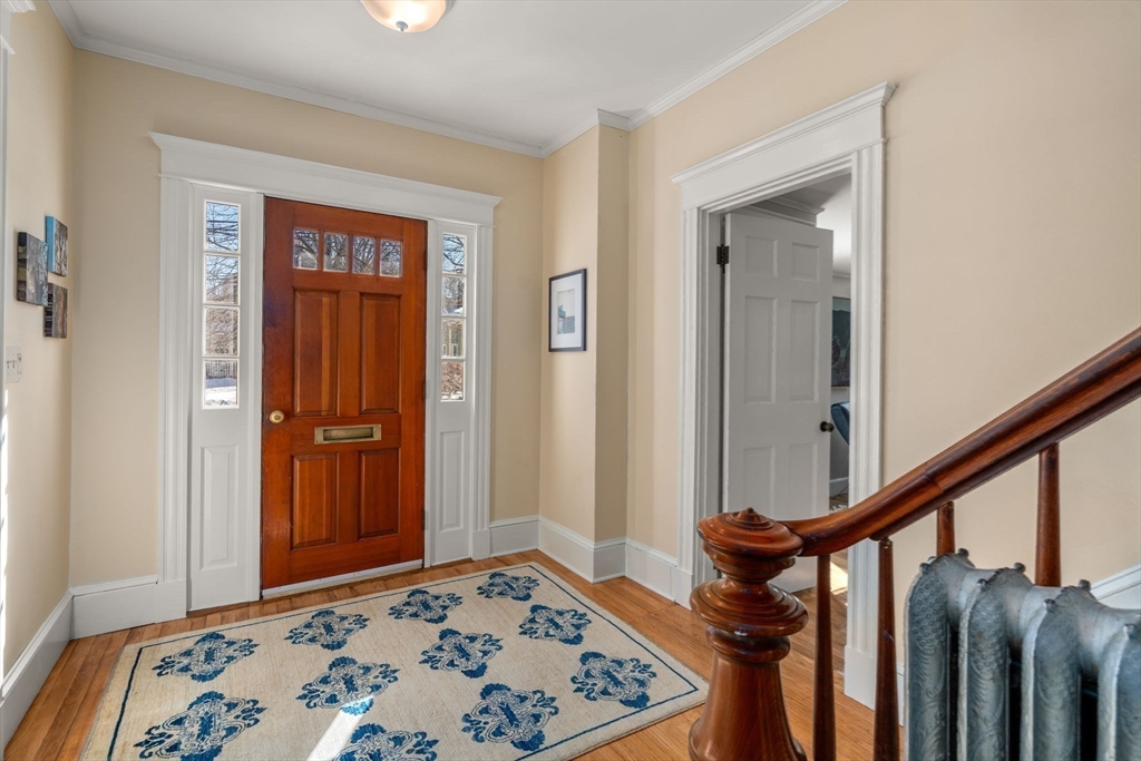 103 Oak Street Reading, MA 01867 - Photo 4 of 35 a view of an entryway with a rug