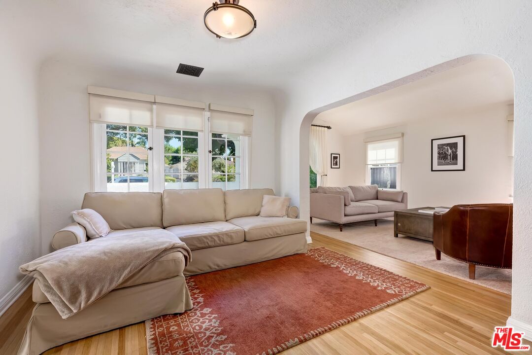 3720 Valleybrink Road Los Angeles, CA 90039 - Photo 11 of 31 a living room with furniture and a large window