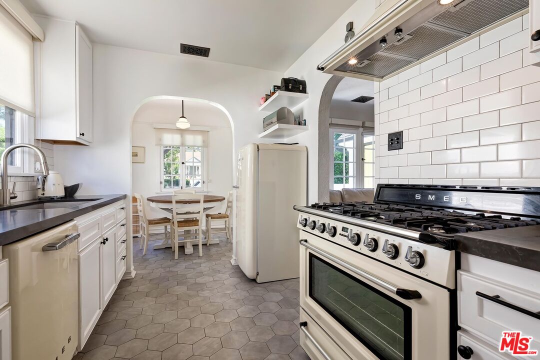 3720 Valleybrink Road Los Angeles, CA 90039 - Photo 13 of 31 a kitchen with a stove and a sink