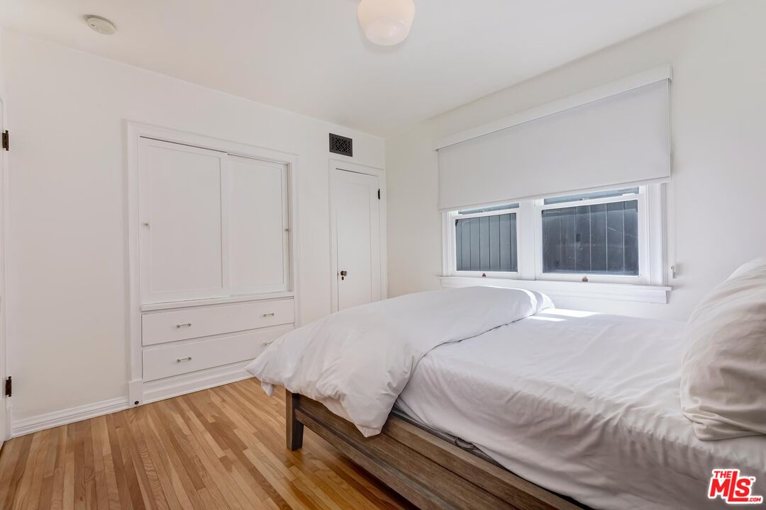 3720 Valleybrink Road Los Angeles, CA 90039 - Photo 18 of 31 a bedroom with a bed and a window