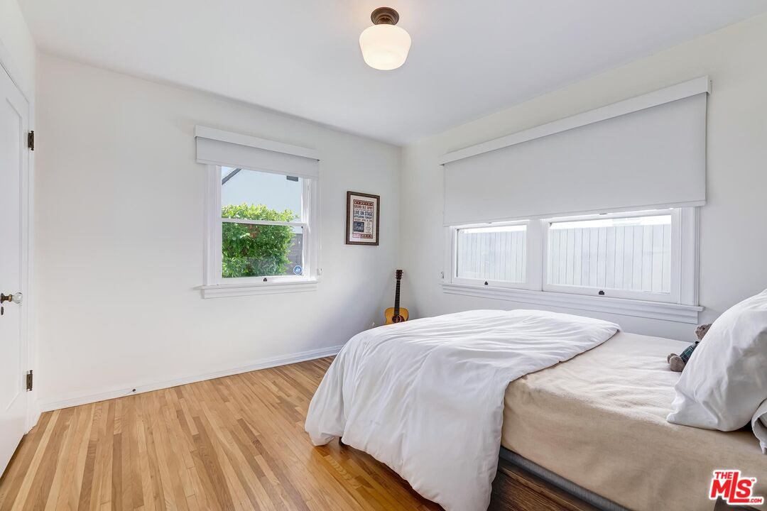 3720 Valleybrink Road Los Angeles, CA 90039 - Photo 20 of 31 a bedroom with a bed and a window