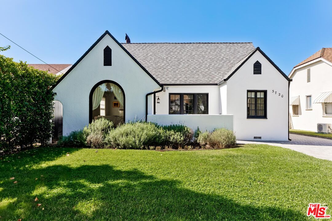 3720 Valleybrink Road Los Angeles, CA 90039 - Photo 2 of 31 a front view of a house with garden