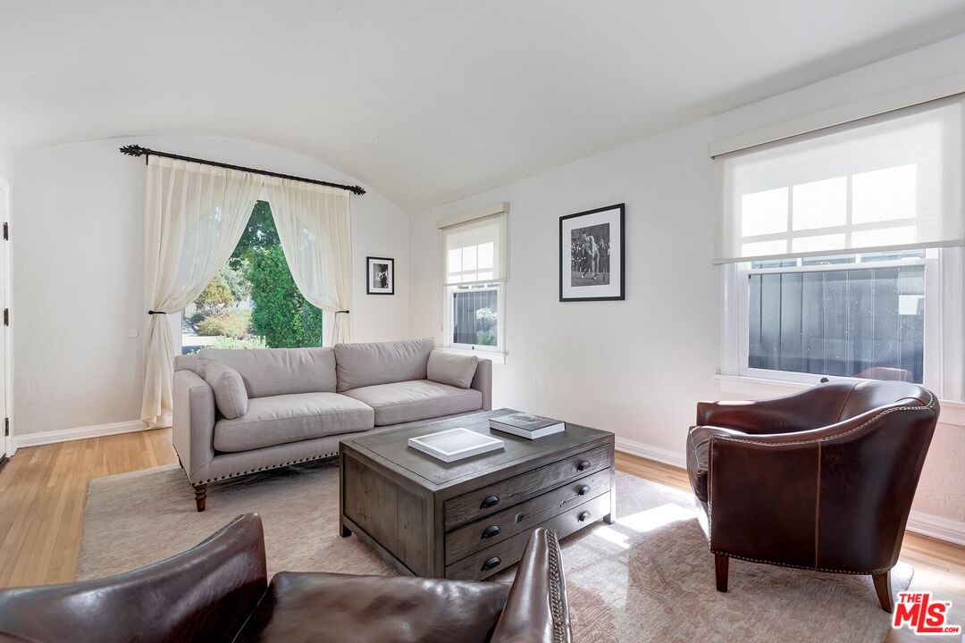 3720 Valleybrink Road Los Angeles, CA 90039 - Photo 7 of 31 a living room with furniture and a window