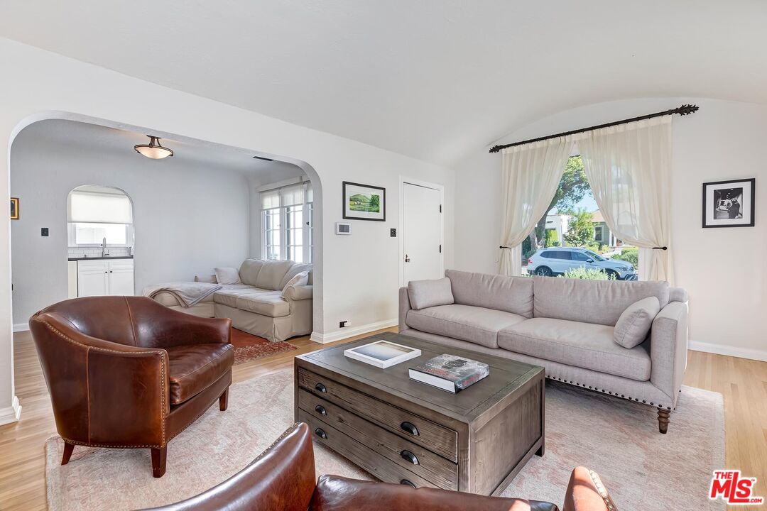 3720 Valleybrink Road Los Angeles, CA 90039 - Photo 8 of 31 a living room with furniture and a window