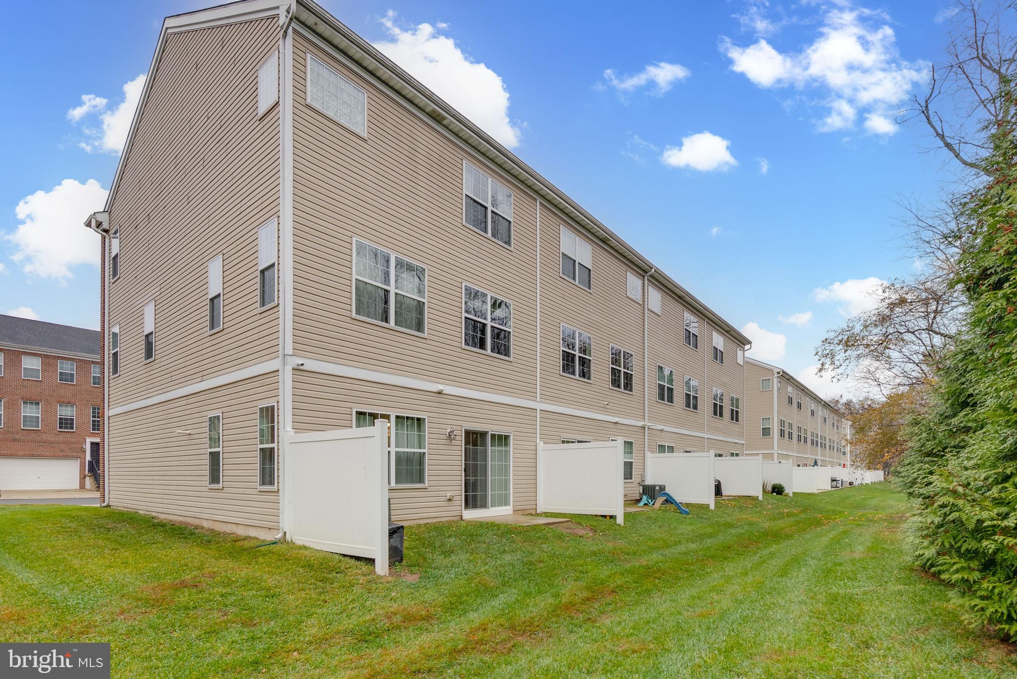 49 Creekside Way Burlington, NJ 08016 - Photo 25 of 25 a large white building with a large windows