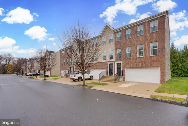 a view of a building with a street