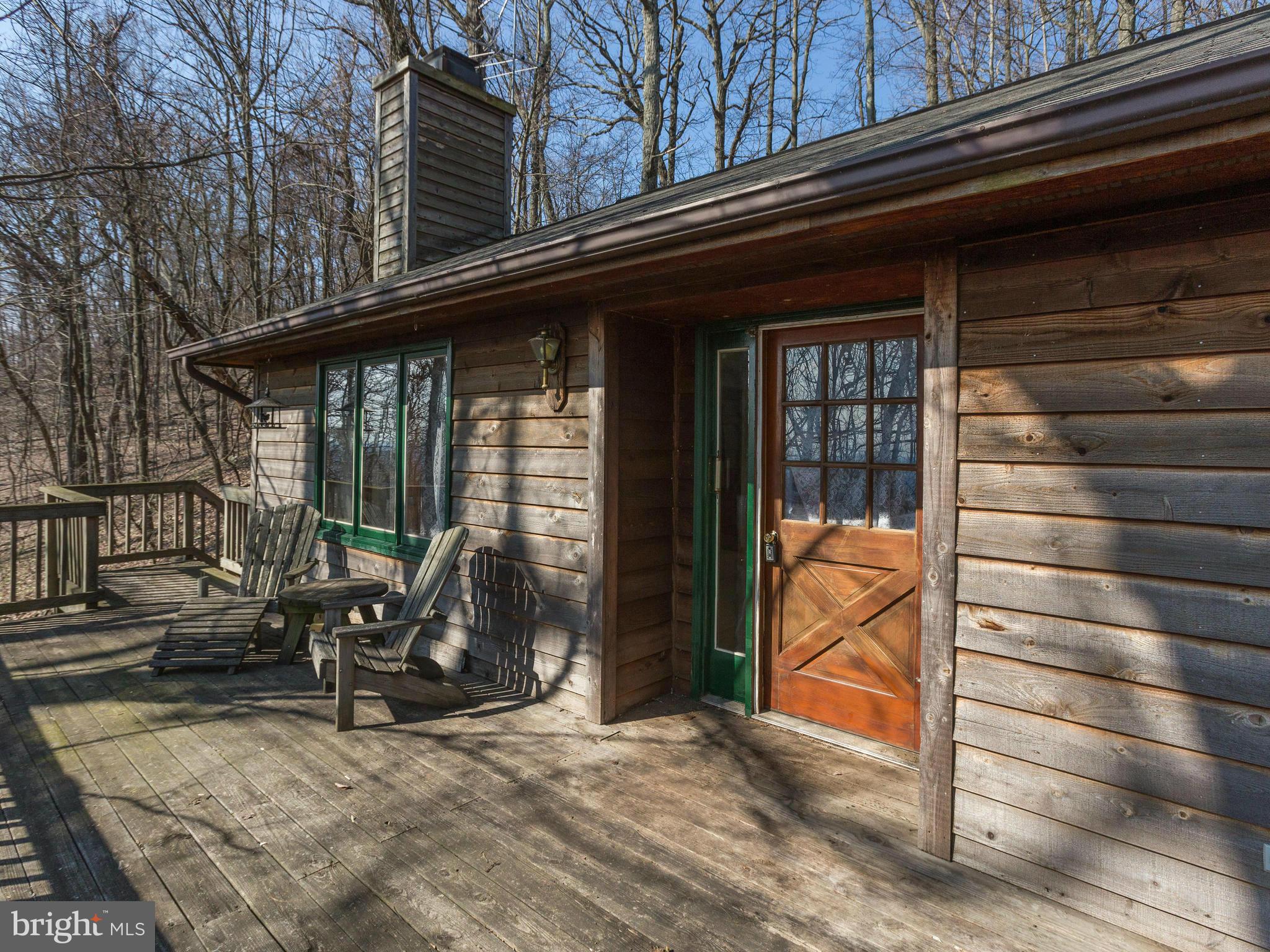 1897 Ridge Road Haymarket, VA 20169 - Photo 2 of 30 a view of a house with backyard outdoor seating and porch