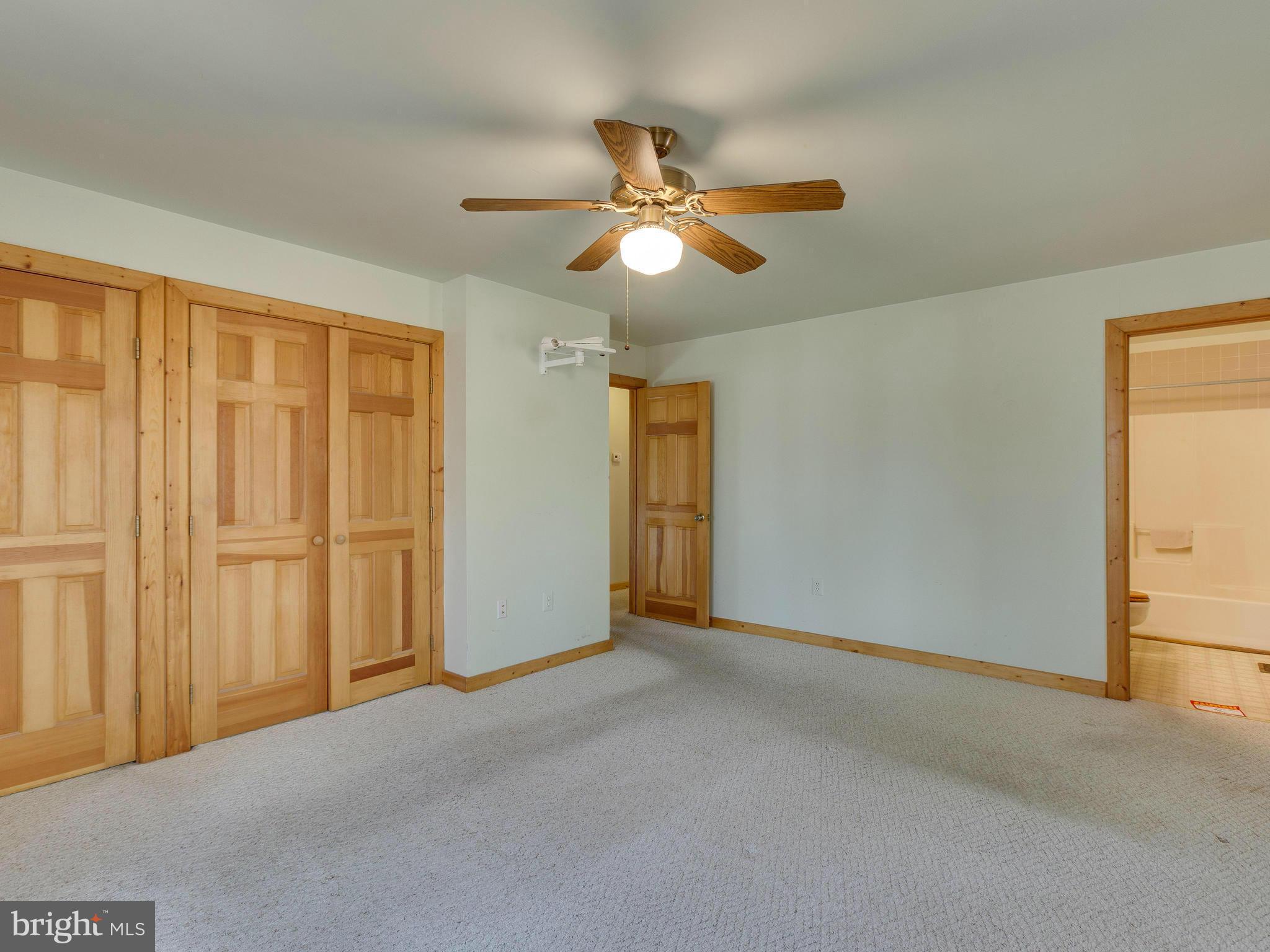 1897 Ridge Road Haymarket, VA 20169 - Photo 18 of 30 a view of an empty room and chandelier fan