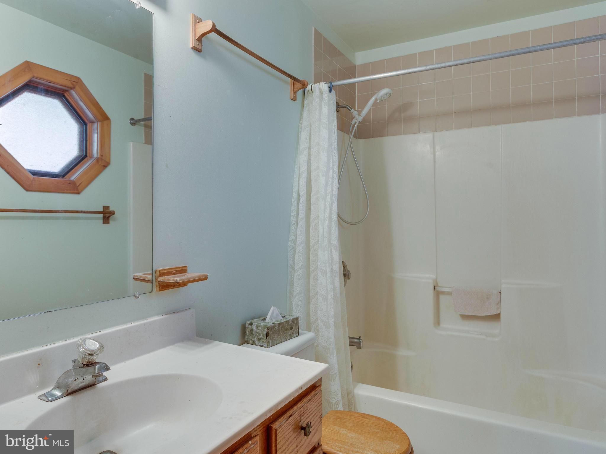 1897 Ridge Road Haymarket, VA 20169 - Photo 19 of 30 a bathroom with a sink toilet and shower