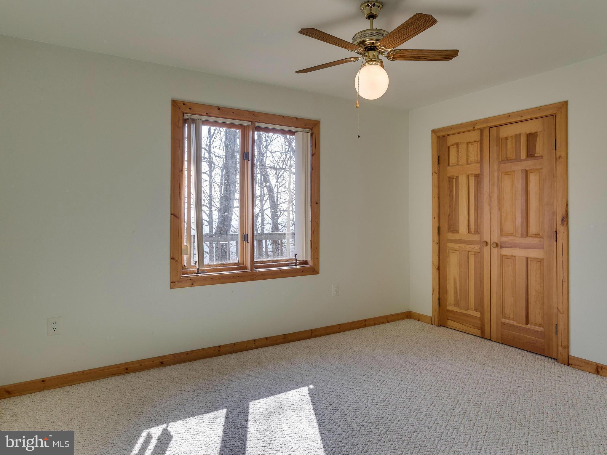 1897 Ridge Road Haymarket, VA 20169 - Photo 21 of 30 a view of an empty room with a window