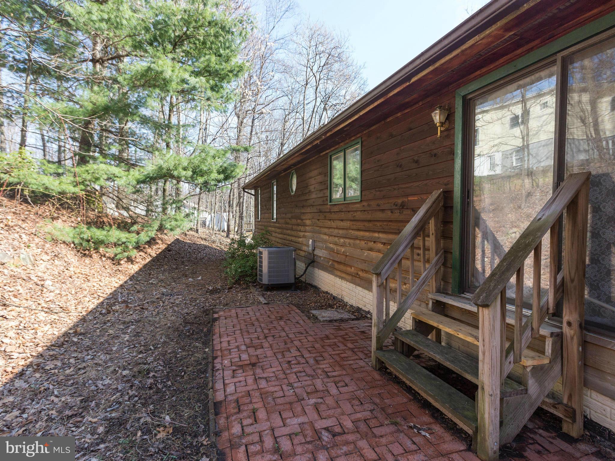 1897 Ridge Road Haymarket, VA 20169 - Photo 29 of 30 a view of a house with backyard and wooden fence