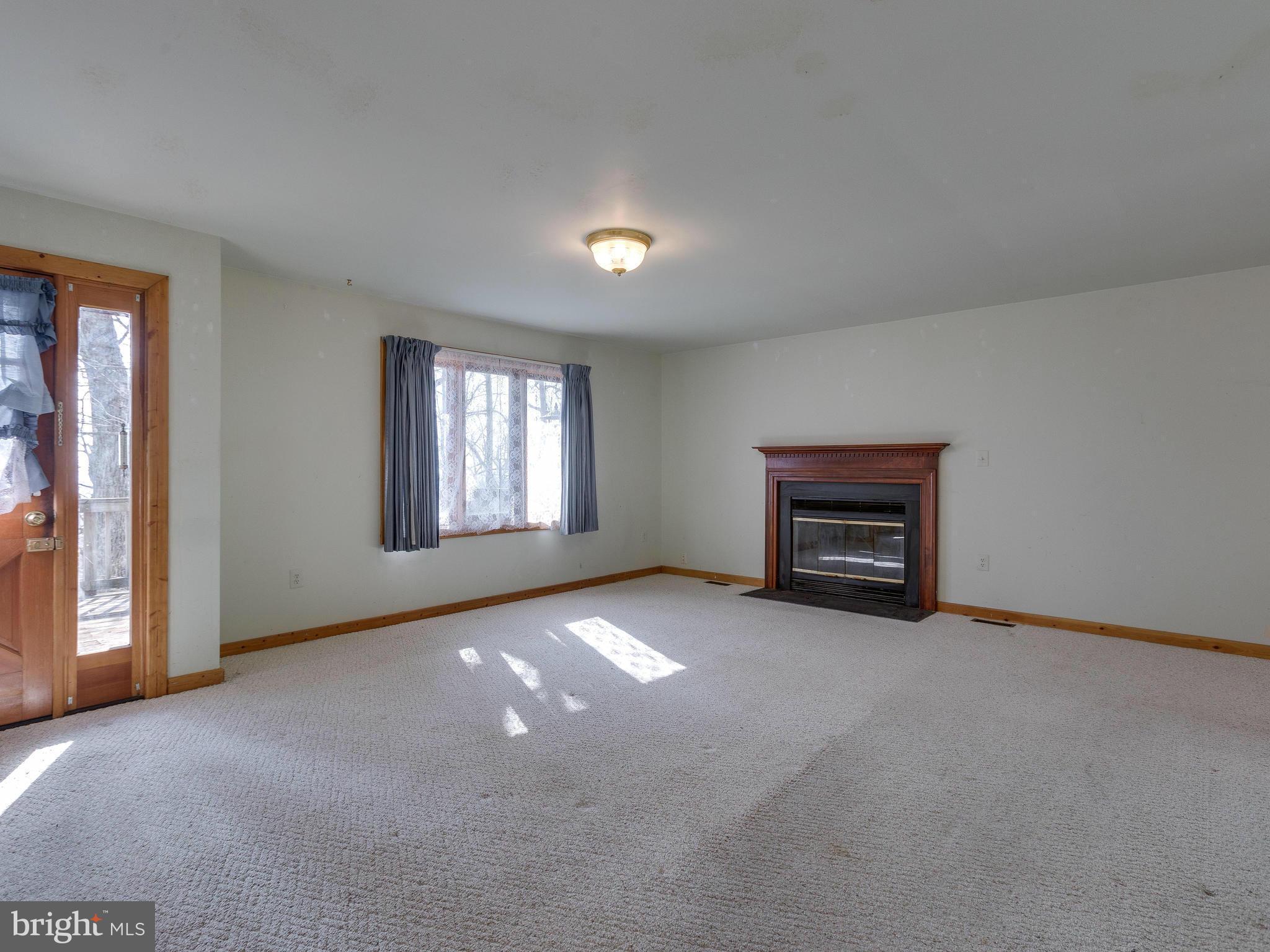 1897 Ridge Road Haymarket, VA 20169 - Photo 7 of 30 an empty room with windows