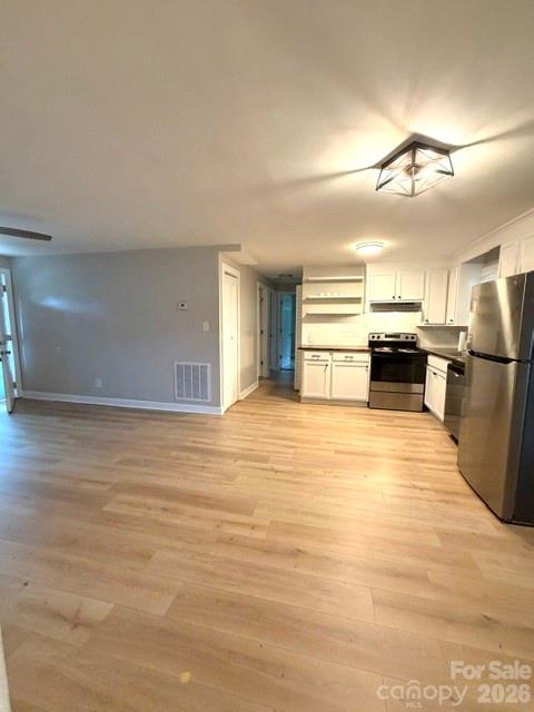 1450 3rd Street Southwest Hickory, NC 28602 - Photo 4 of 17 a view of kitchen and refrigerator