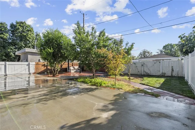 a house with trees in the background