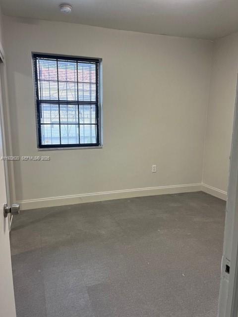 3310 Northwest 4th Street Miami, FL 33125 - Photo 8 of 9 an empty room with a window