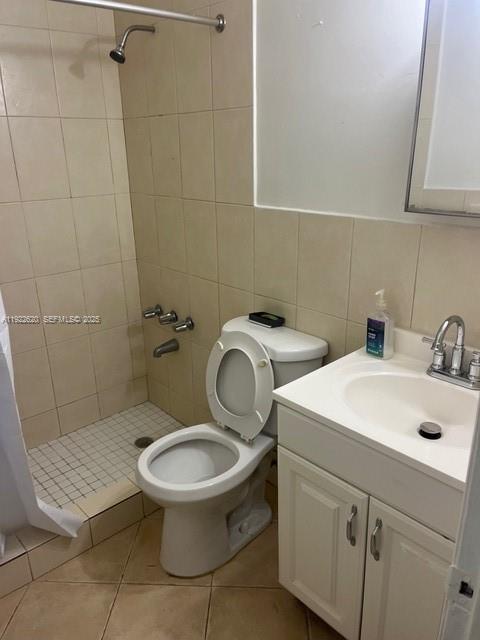 3310 Northwest 4th Street Miami, FL 33125 - Photo 9 of 9 a bathroom with a sink toilet and a mirror