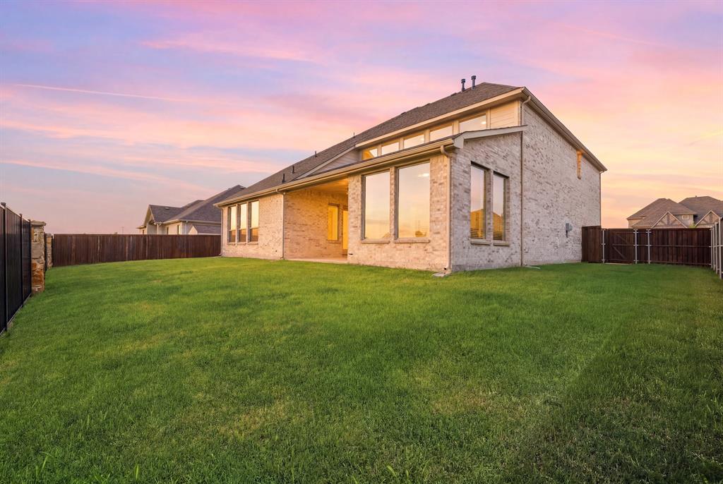 1313 Kirkwood Road Rockwall, TX 75087 - Photo 11 of 39 Twilight view of backyard!