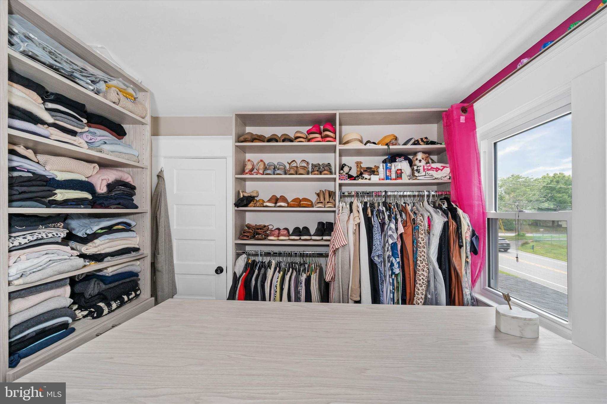 3024 Foulk Road Garnet Valley, PA 19060 - Photo 19 of 43 a view of walk in closet with clothes and shoes