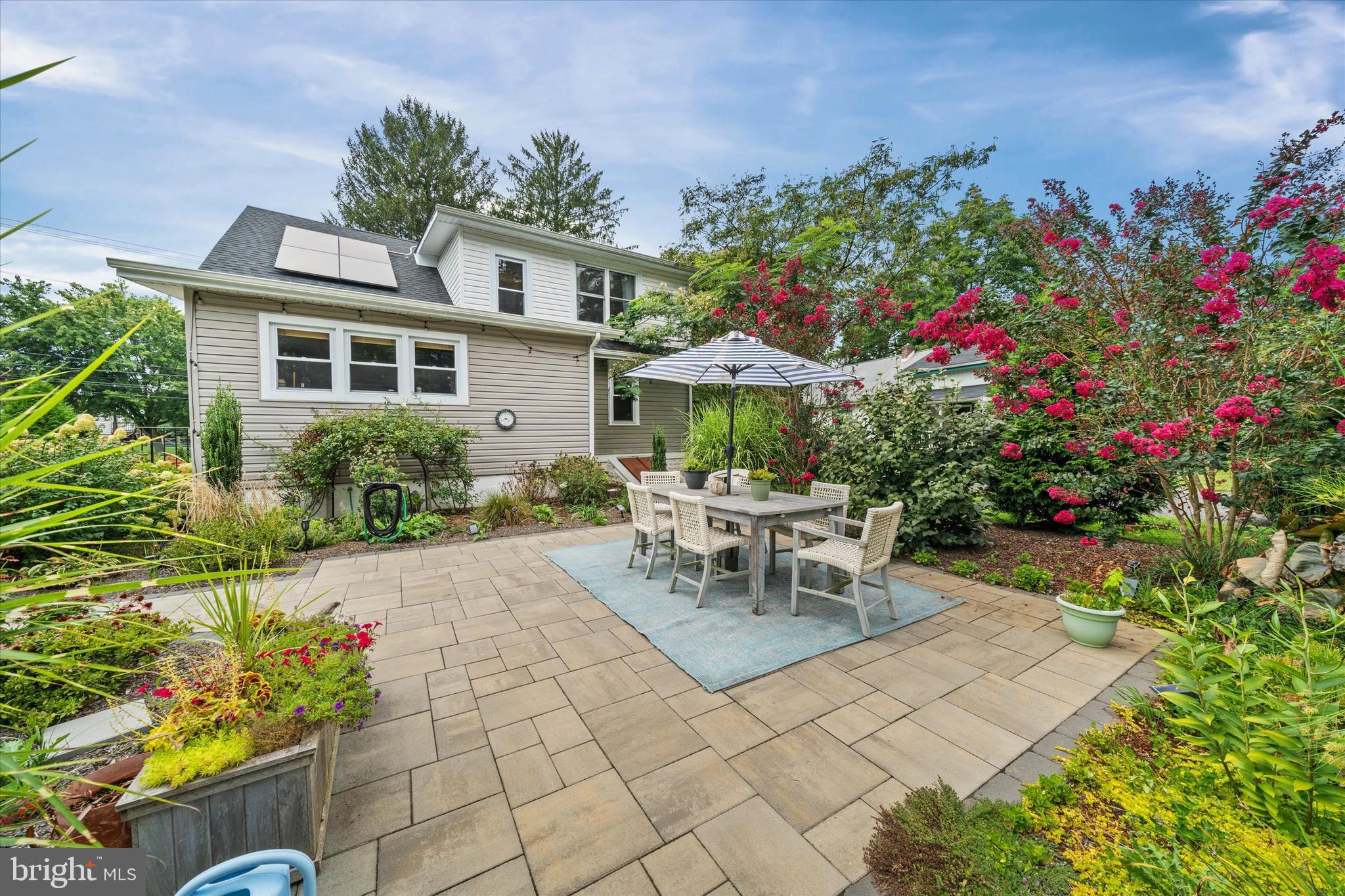 3024 Foulk Road Garnet Valley, PA 19060 - Photo 36 of 43 a view of a patio with table and chairs and potted plants