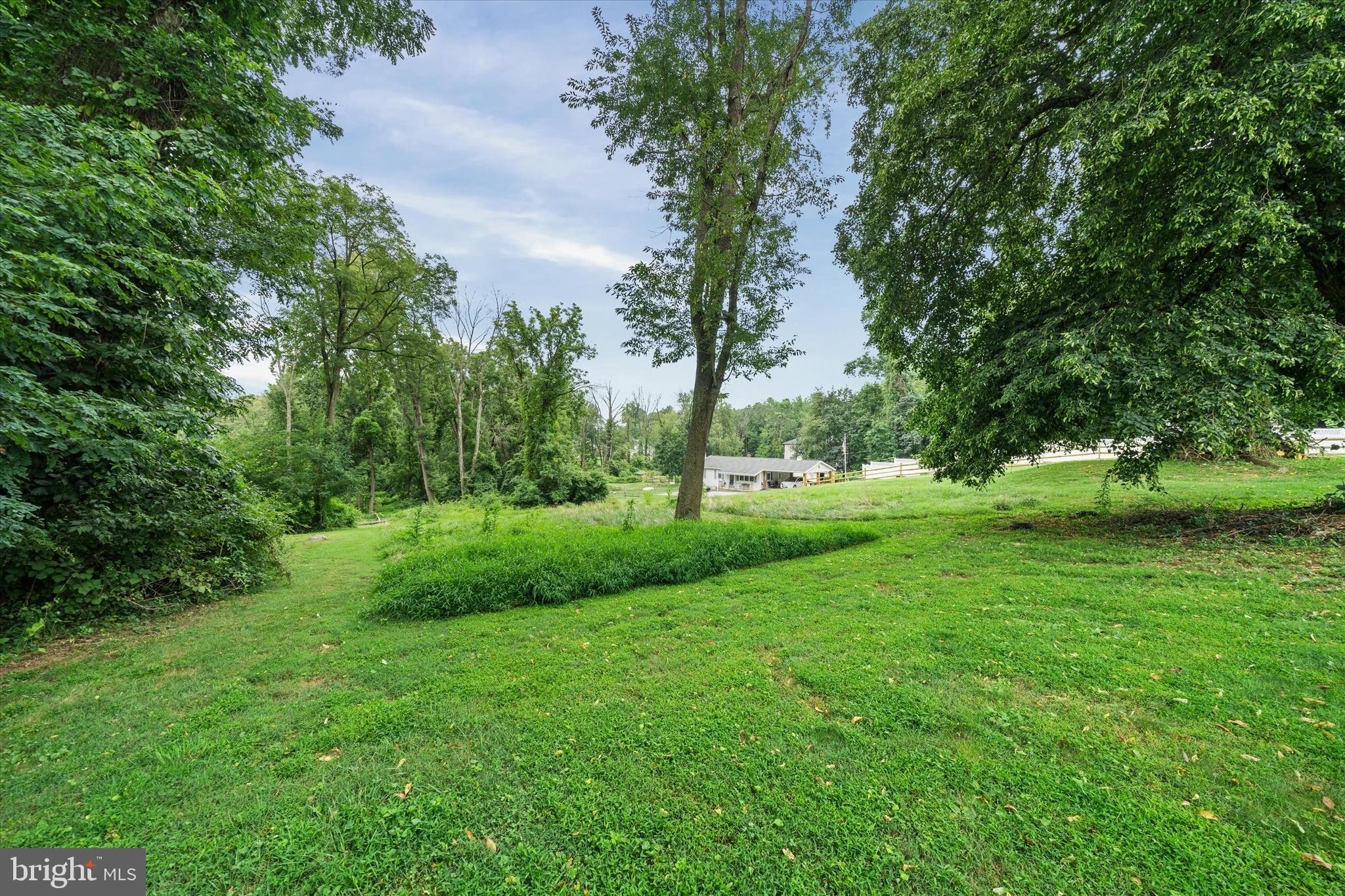 3024 Foulk Road Garnet Valley, PA 19060 - Photo 40 of 43 a view of a park with trees and flowers