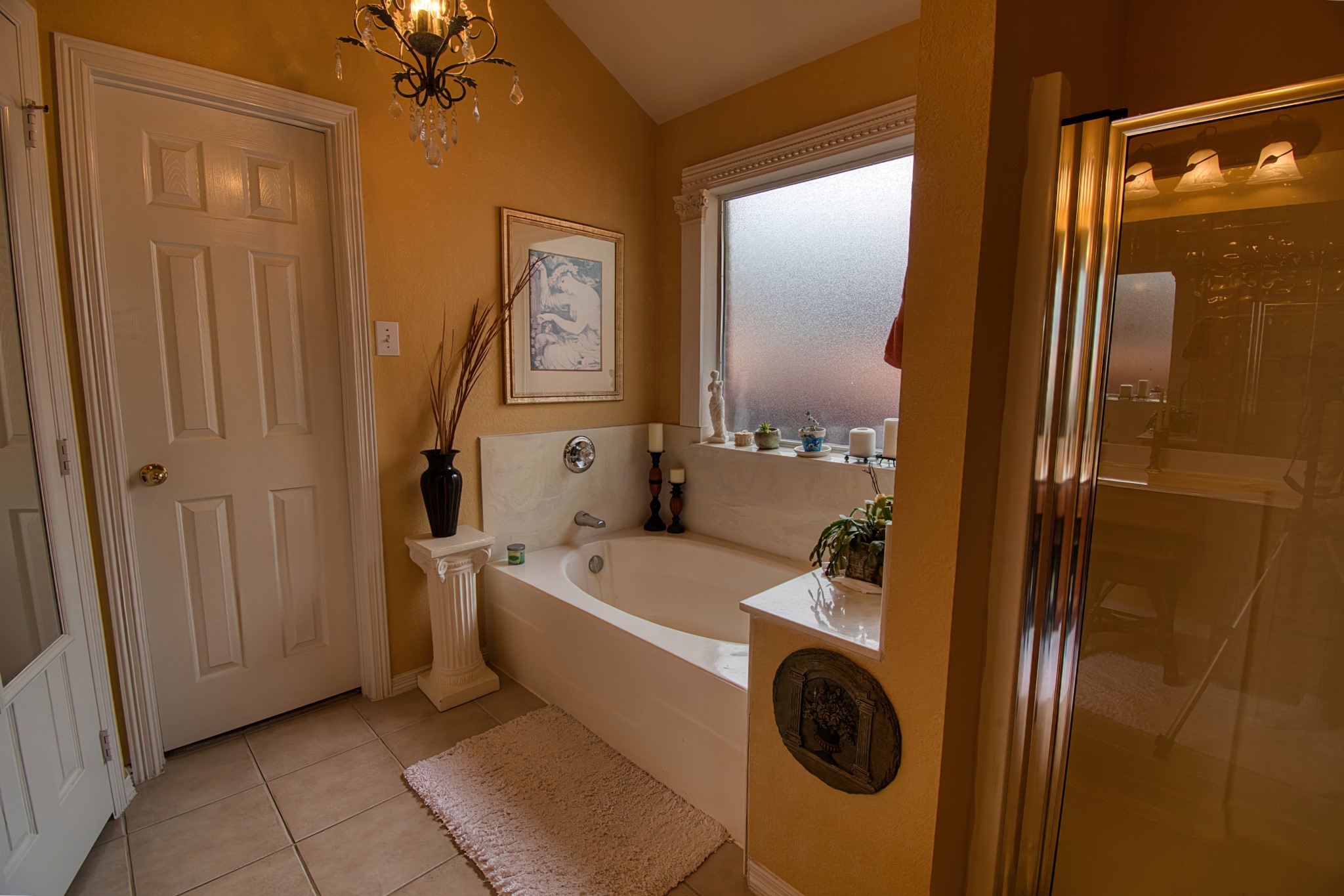 225 Mesa View Montgomery, TX 77316 - Photo 26 of 37 a bathroom with a tub a sink and a mirror