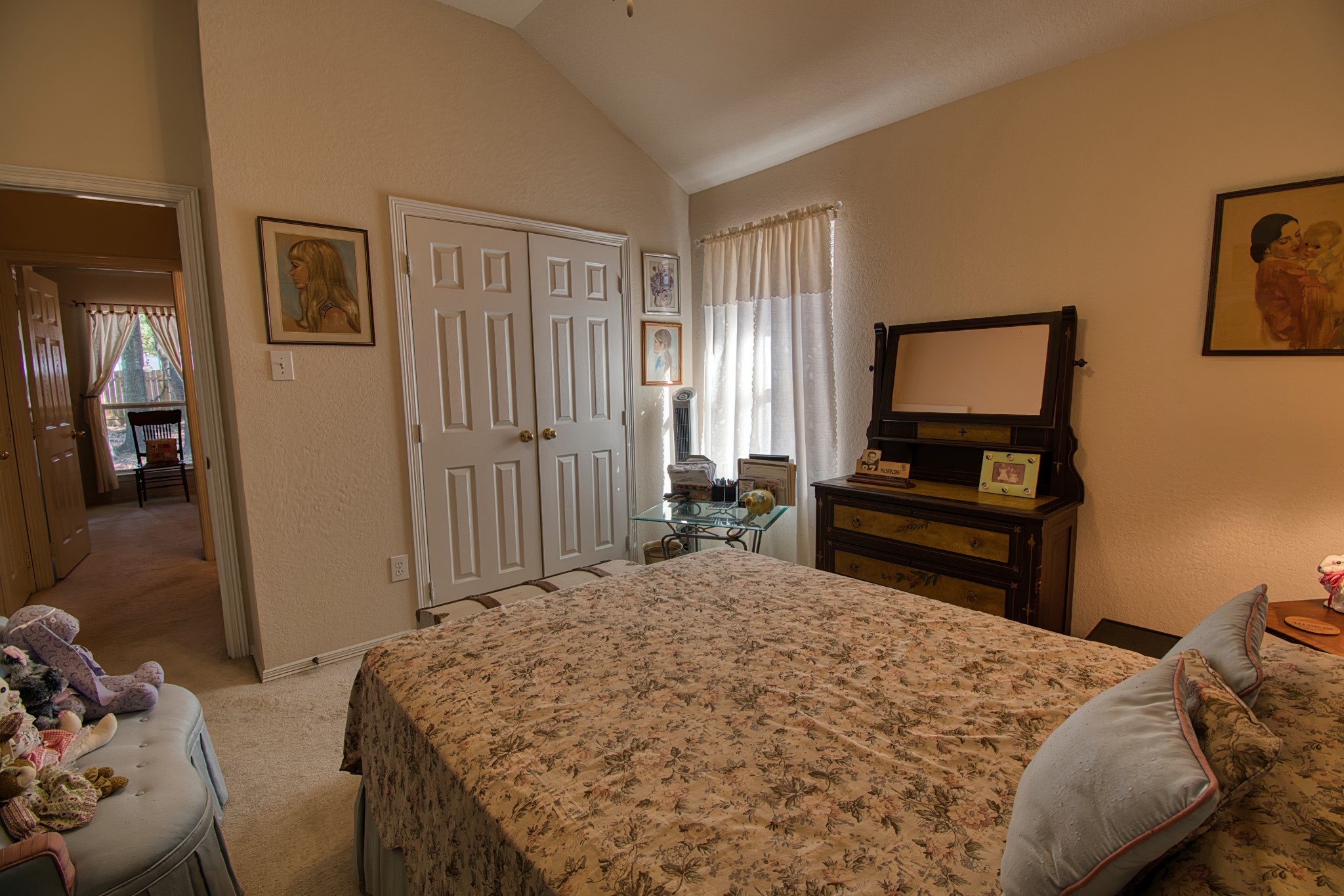 225 Mesa View Montgomery, TX 77316 - Photo 28 of 37 a bed sitting in a bedroom next to a window