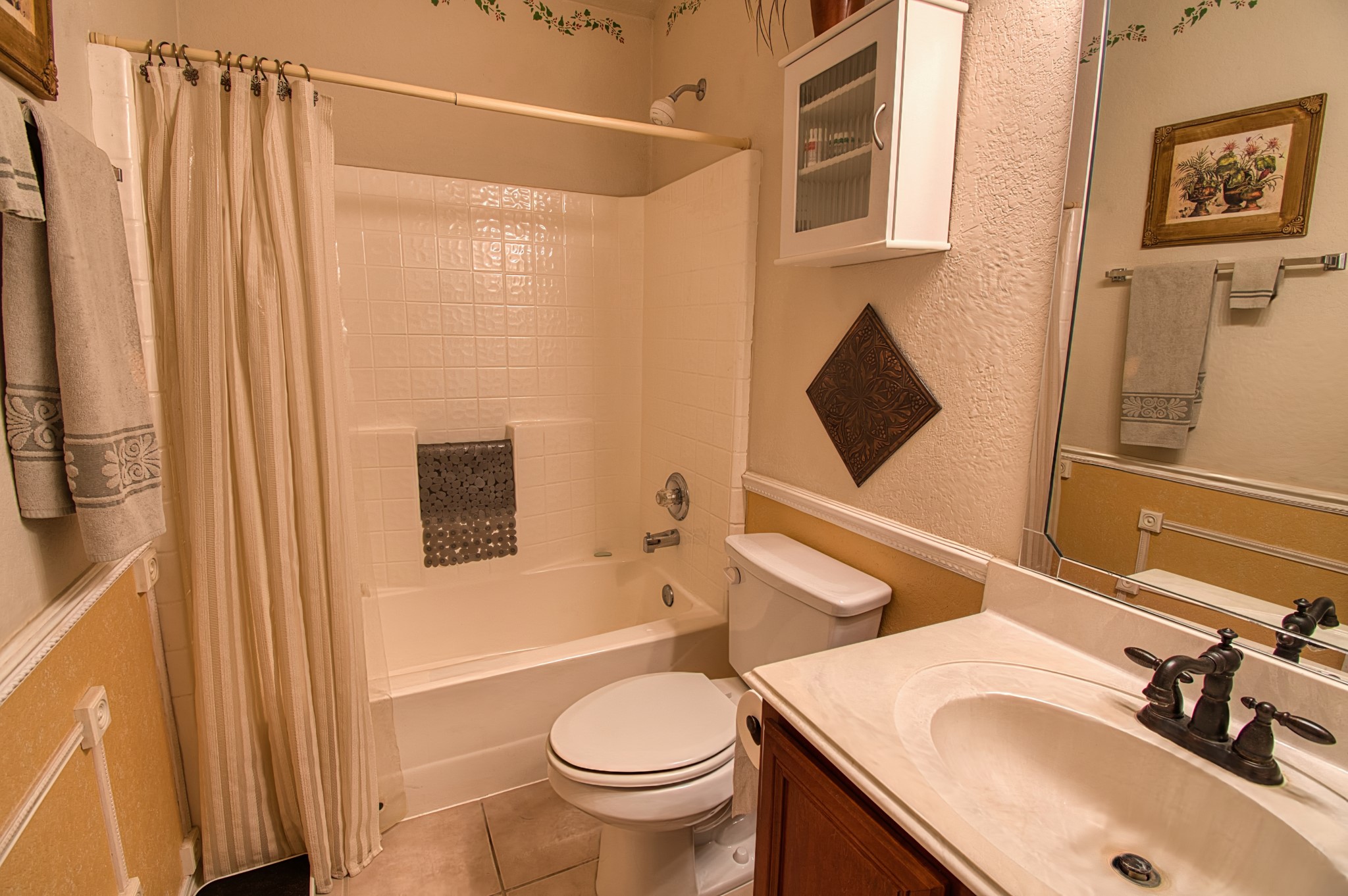 225 Mesa View Montgomery, TX 77316 - Photo 34 of 37 a bathroom with a sink toilet and tub