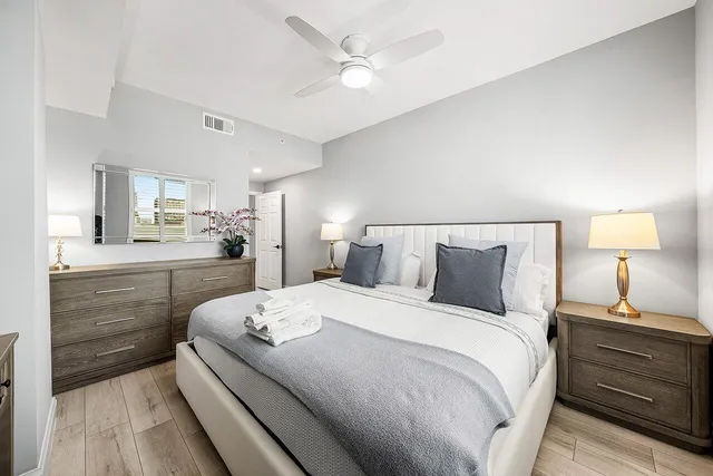 a bedroom with a bed and a closet