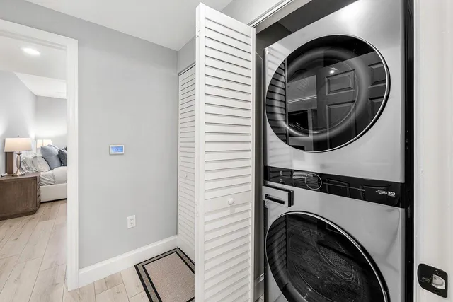a close view of a utility room with washer and dryer