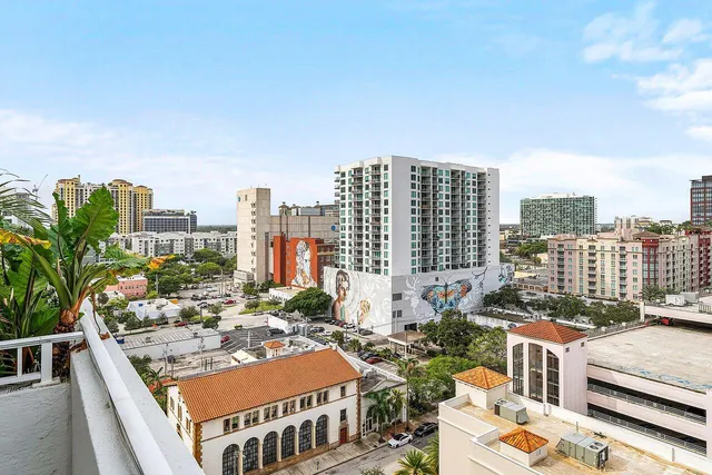 a view of city with tall buildings