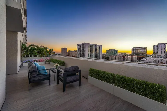 a view of a terrace with chairs