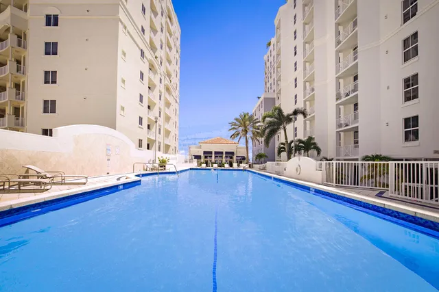 a view of a living room and chandelier