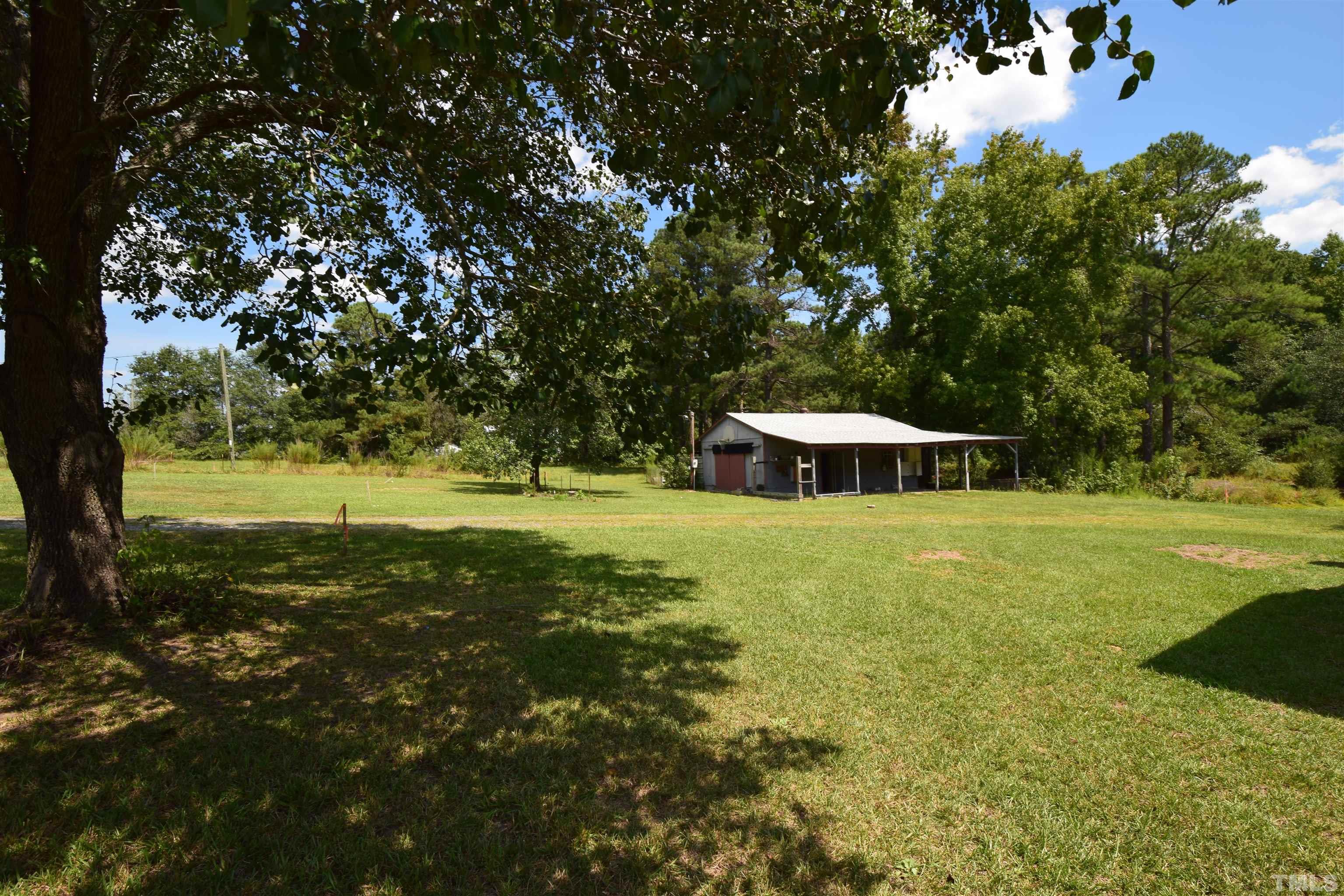 464 Young Road Angier, NC 27501 - Photo 3 of 3 a view of a trees with yard