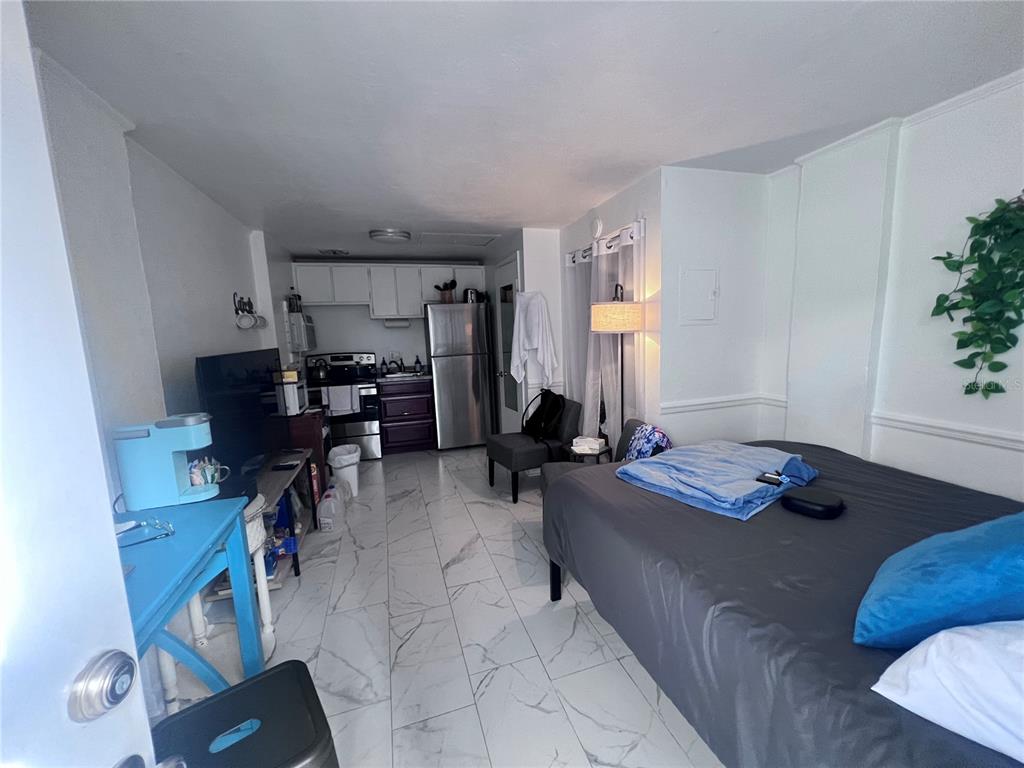 113 Northwest 11th Street Gainesville, FL 32601 - Photo 12 of 12 a workspace with furniture and a window