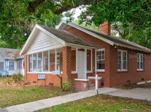 113 Northwest 11th Street Gainesville, FL 32601 - Photo 2 of 12 front view of a house with a yard