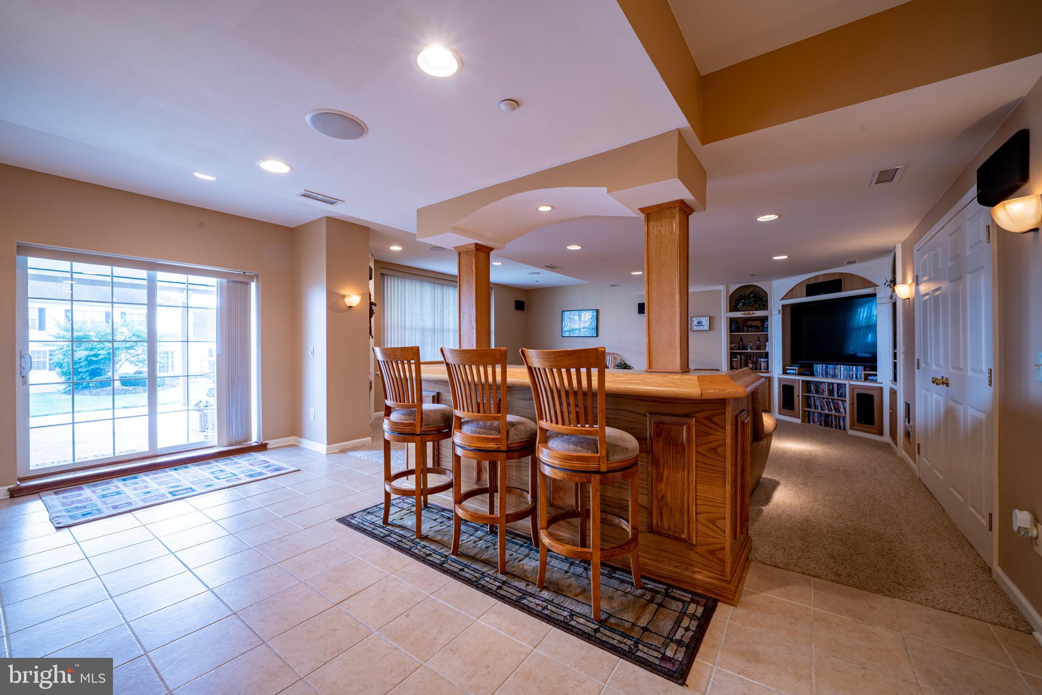 122 Statesman Road Chalfont, PA 18914 - Photo 51 of 54 Basement Bar, Entertainment Space & Walkout Access