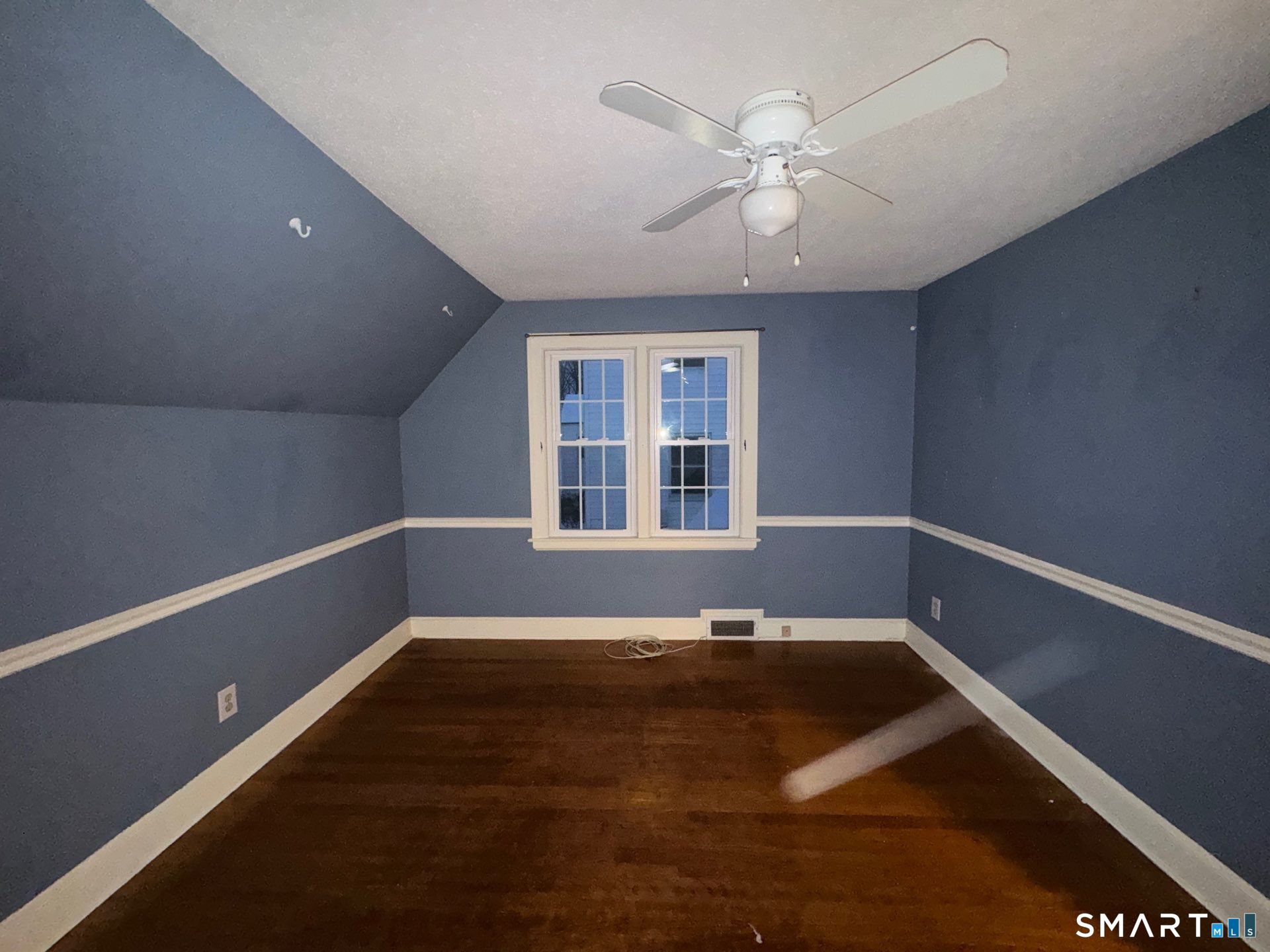 81 Lancaster Road Bristol, CT 06010 - Photo 16 of 30 a view of a room with a window and a ceiling fan