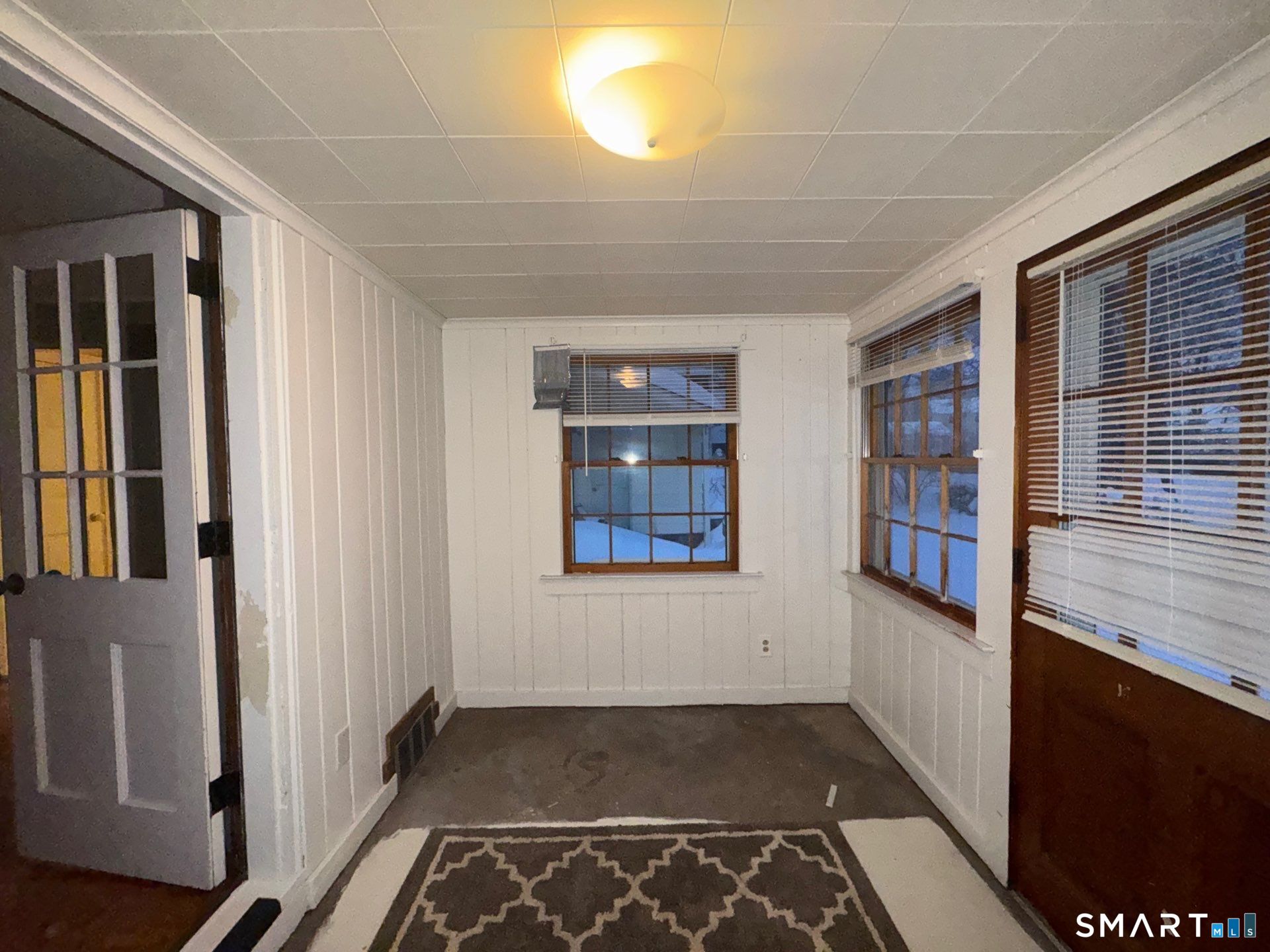 81 Lancaster Road Bristol, CT 06010 - Photo 2 of 30 an empty room with windows