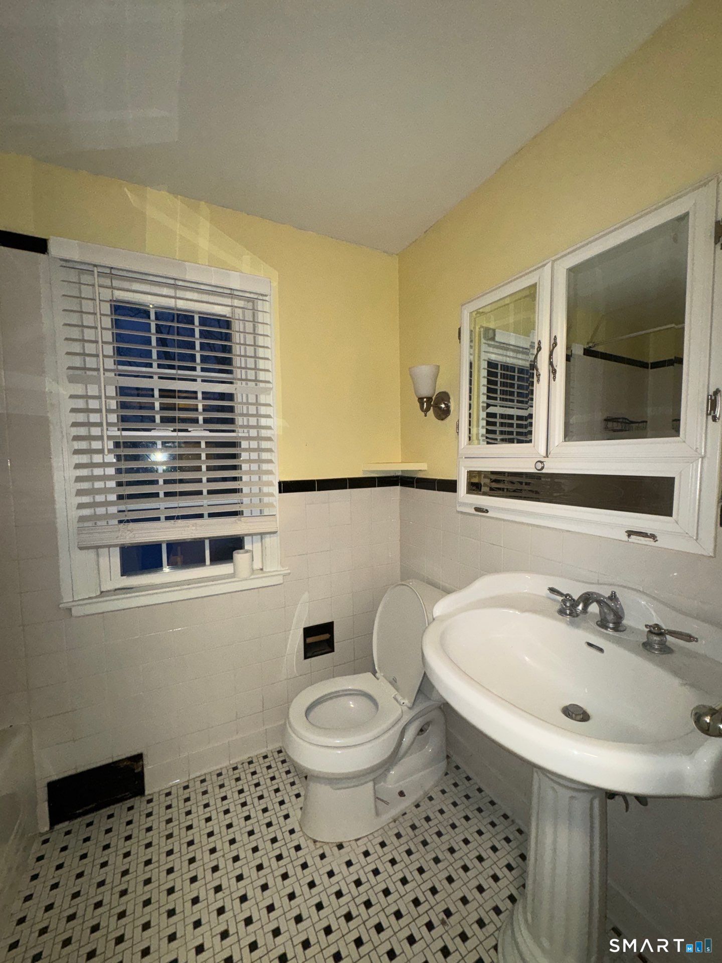 81 Lancaster Road Bristol, CT 06010 - Photo 21 of 30 a bathroom with a sink toilet a mirror and shower