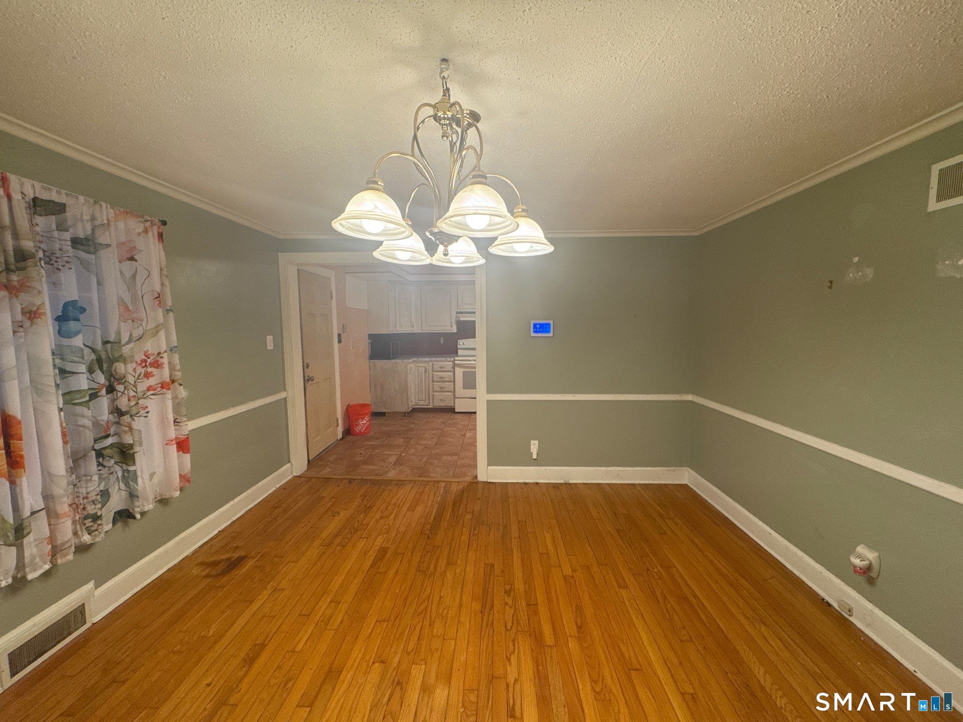 81 Lancaster Road Bristol, CT 06010 - Photo 25 of 30 a view of a livingroom with wooden floor