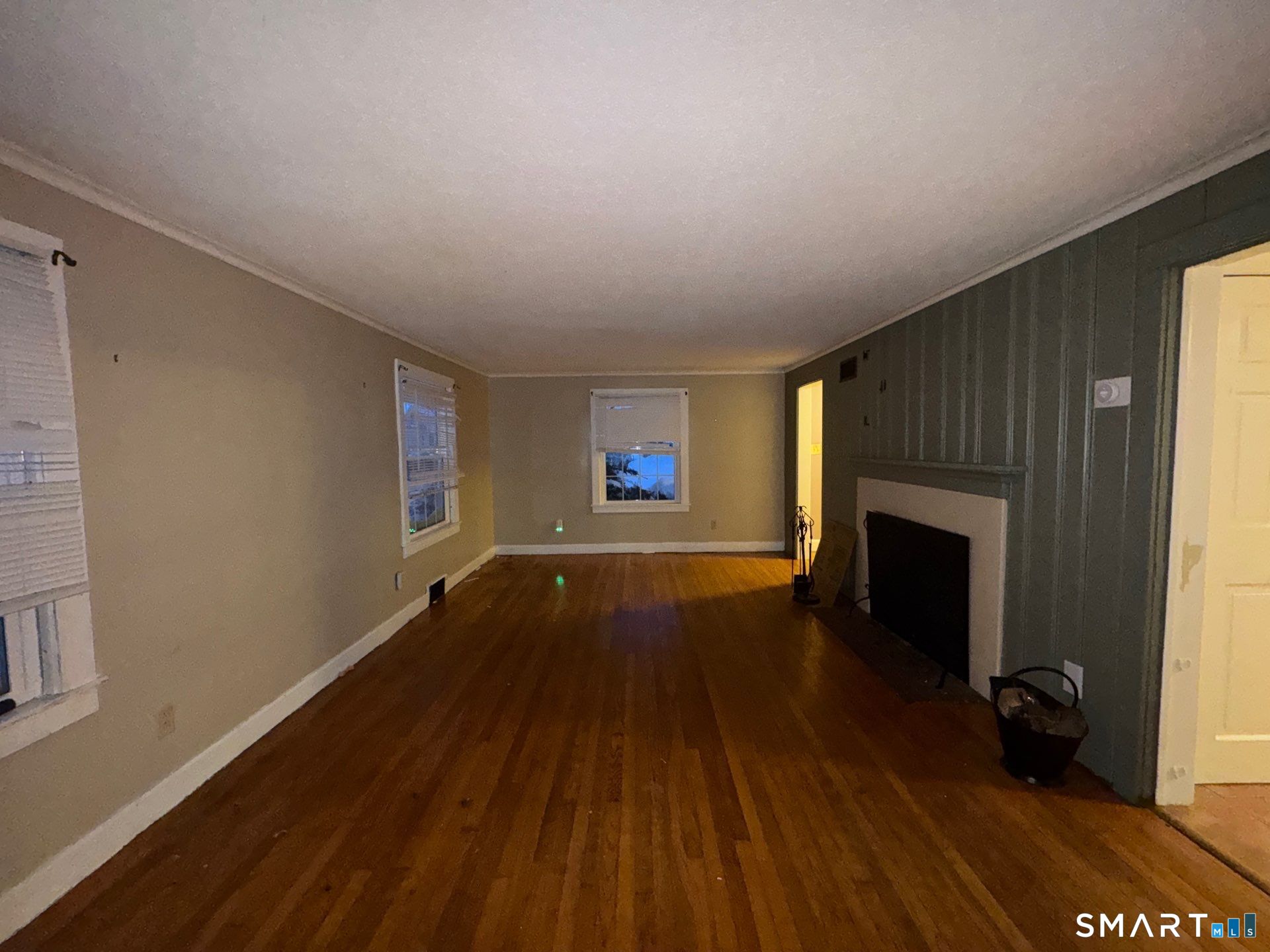 81 Lancaster Road Bristol, CT 06010 - Photo 8 of 30 wooden floor in an empty room with a window