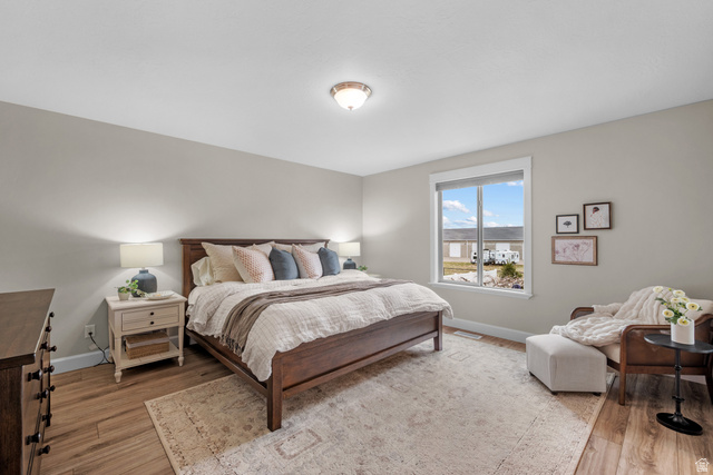 1896 West 800 North Mapleton, UT 84663 - Photo 13 of 55 Bedroom featuring baseboards and light wood finished floors