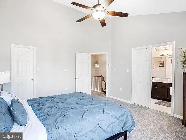 10864 Caraway Circle Manassas, VA 20109 - Photo 13 of 16 a bedroom with a bed and a walk in closet